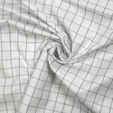 Popeline polycoton tissée-teinte à carreaux Barnabé gris fond blanc