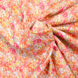 Coton imprimé Matilde fleurs mandarine et rose au mètre
