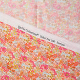 Coton imprimé Matilde fleurs mandarine et rose au mètre