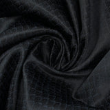 Satin de soie imprimé peau de serpent fond noir