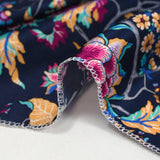 Satin de soie imprimé fleurs indiennes violine fond marine