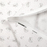 Cotton piqué with hedgehog print and pink polka dots on white background