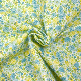 Piqué de coton imprimé les fleurs de Sarah bleu et jaune fond blanc