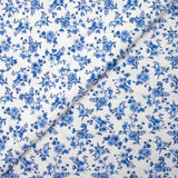 Piqué de coton imprimé les fleurs de Louna bleu fond blanc
