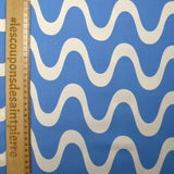 Viscose satin printed with ecru waves and sky background