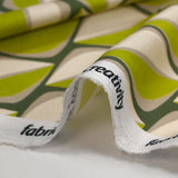 Viscose satin printed with retro anise look, khaki background