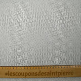 Viscose crepe with gray and white hexagonal labyrinth print