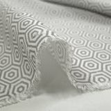 Viscose crepe with gray and white hexagonal labyrinth print