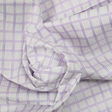 Dyed-woven cotton poplin with purple checks on white background
