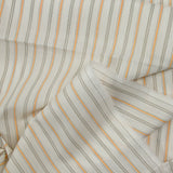 Dyed-woven cotton poplin with orange stripes and white background