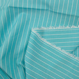 Striped dyed-woven cotton poplin with curaçao background