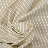 Red striped dyed cotton poplin, sand background