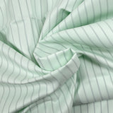 Striped cotton twill with pale green background