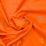 Cotton sports print with orange background