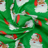 Santa Claus printed cotton with green polka dots