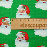 Santa Claus printed cotton with green polka dots