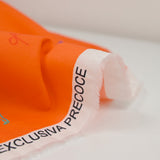 Cotton sports print with orange background