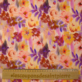 Viscose satin with blurred floral print on a blush background