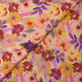 Viscose satin with blurred floral print on a blush background