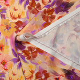 Viscose satin with blurred floral print on a blush background