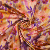 Viscose satin with blurred floral print on a blush background