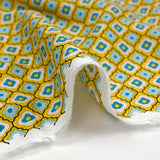 Viscose printed blue graphic flowers sunny yellow background