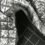 Silver quilted black background
