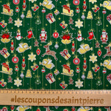 Popeline de coton imprimée esprit de Noël doré fond vert