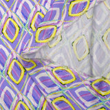 Viscose satin with retro disco print, purple background