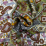 Viscose satin patchwork print with brown, apple green and ocher ornament