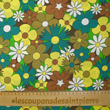 Algodón con estampado de flores disco turquesa, marrón y amarillo mantequilla
