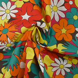 Red, orange and turquoise disco flower print cotton