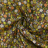 Cotton printed meadow in flowers yellow dark brown background