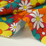 Red, orange and turquoise disco flower print cotton