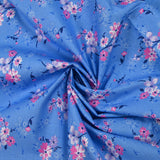 Cotton poplin printed bouquet in the clouds cornflower blue background
