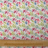 Cotton poplin printed with colorful foliage on white background