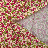 Cotton poplin printed with raspberry morning dew and ecru background