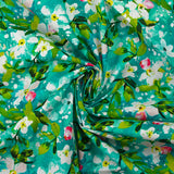 Jasmine printed cotton poplin with turquoise background