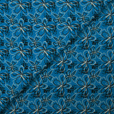 Cotton poplin printed with floral gesture on a petrol blue background