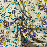 Cotton poplin printed with earthenware flowers on an ecru background
