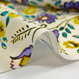 Cotton poplin printed with earthenware flowers on an ecru background