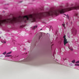 Cotton poplin printed with seasonal bouquet orchid background
