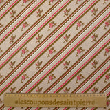 Cotton poplin printed diagonally with flowers on beige background