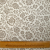 Cotton poplin printed with taupe floral print, off-white background
