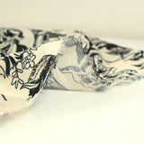 Crepe printed with black wood whisper on ecru background