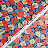 Coton liberty ® Myria rouge fond marine au mètre