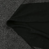 Jersey de poliéster iridiscente plateado con fondo negro