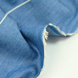 Lucie embroidered cotton chambray denim background