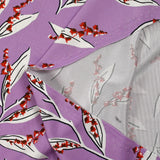 Satin viscose knit printed with a sprig of lily of the valley, mauve background