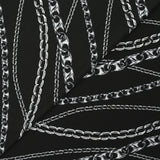 Satin viscose knit printed in black background chain